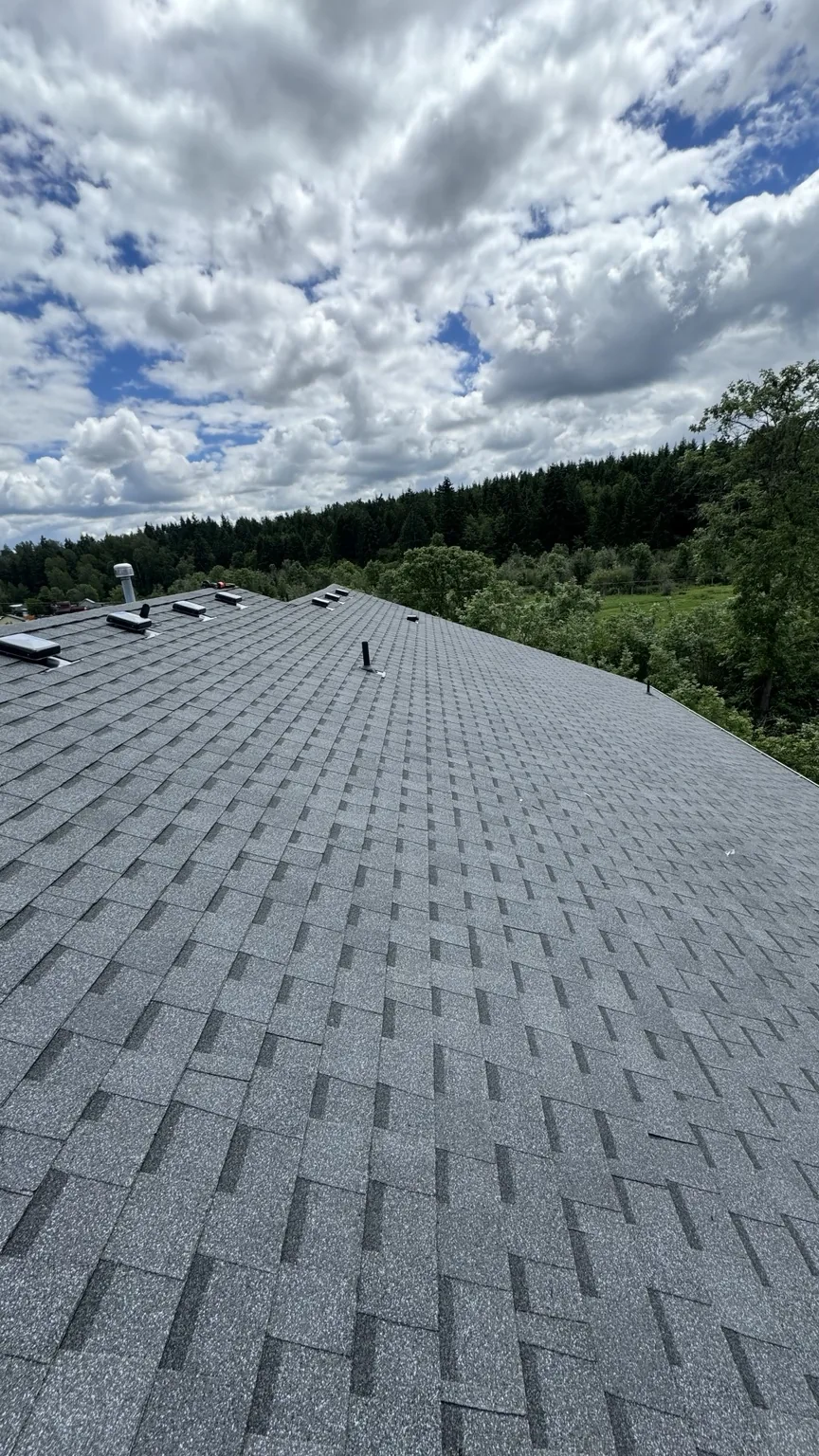 Wide view of completed property management roofing project