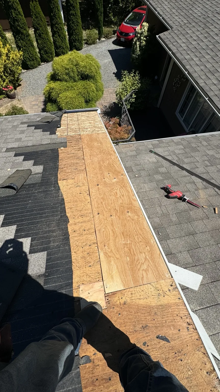 Installing solid new roof decking during residential roof repair